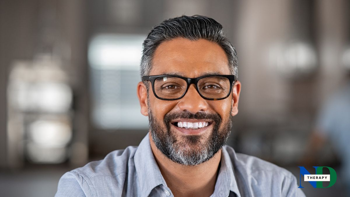 older-man-beard-smiling Older man with a beard smiling.