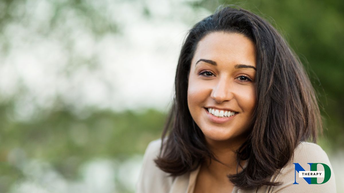woman-dark-hair-smiling Woman with dark hair smiling.