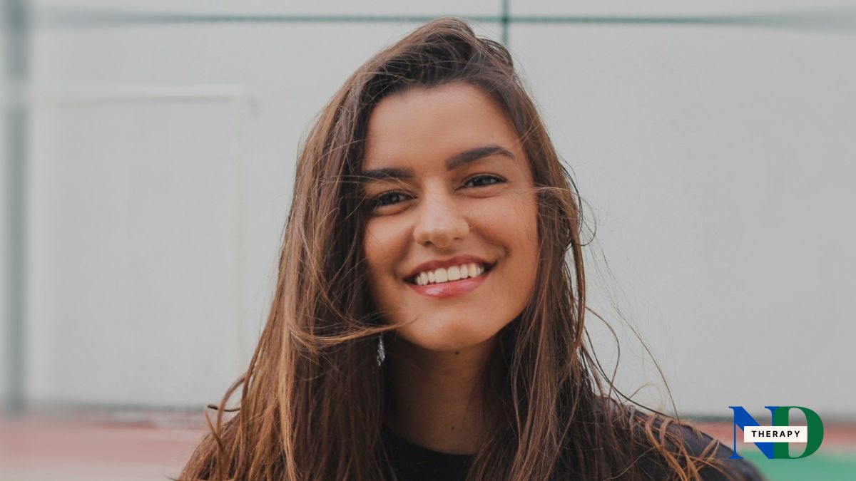woman-long-hair-smiling Woman with long hair smiling.