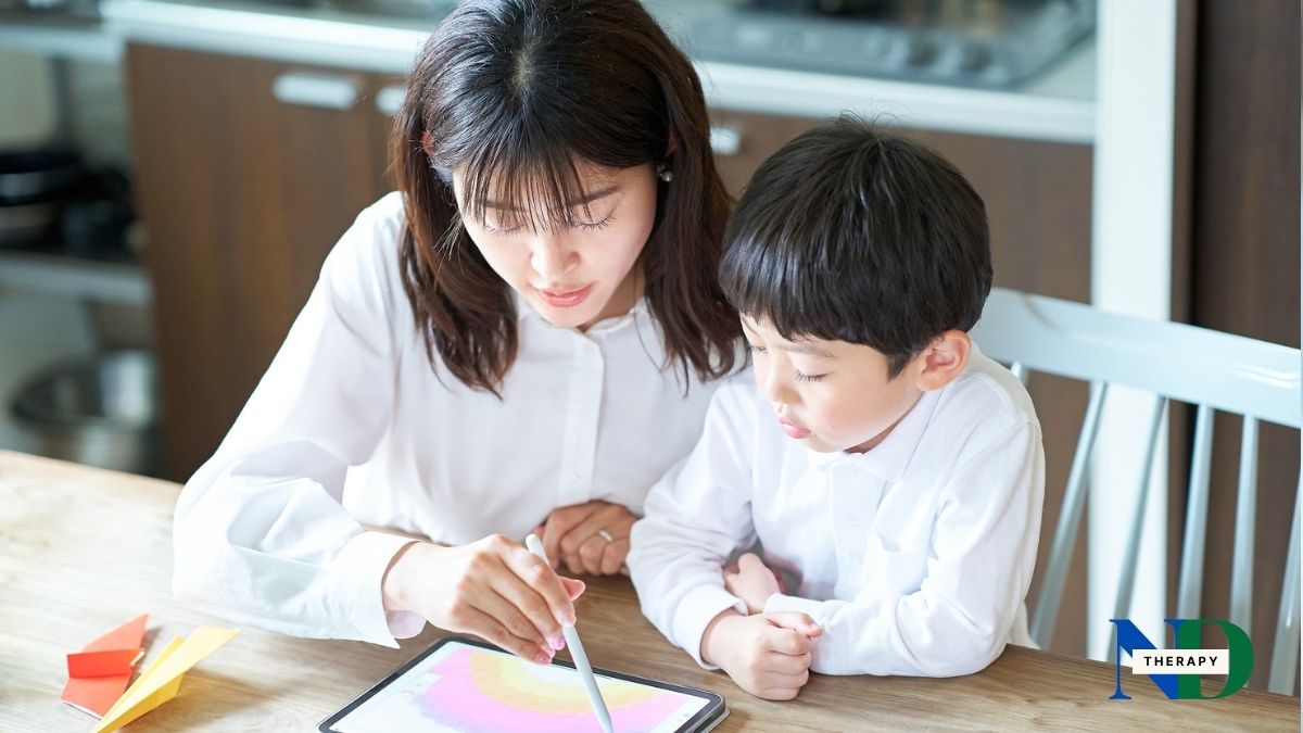 A parent instructs their child on a tablet.