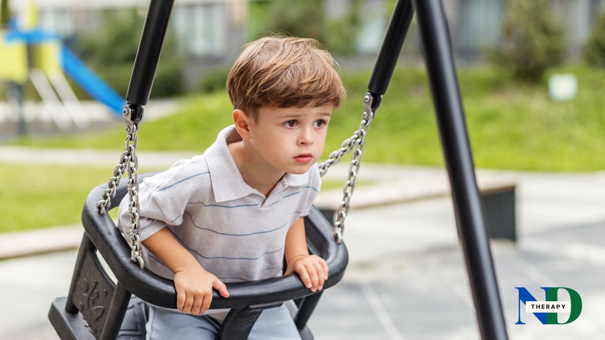 A child on a swing, stressed.