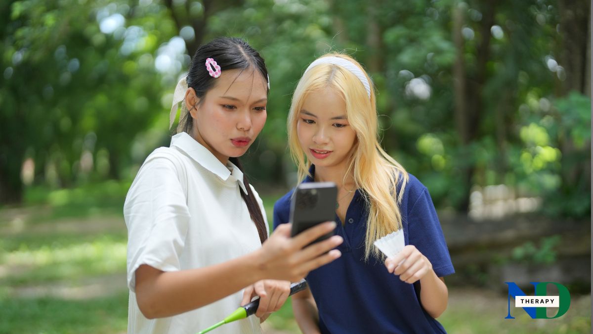 Teem girls viewing social media.