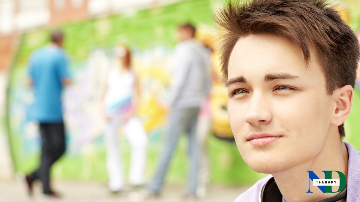 male-teen-outside Male teen outside with friends.