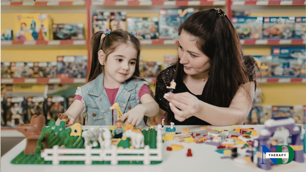 A young girl plays with legos with her mother, instead of being on a screen. 